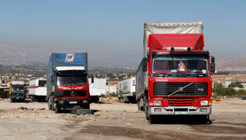 Trucks near the Masnaa Lebanon-Syria border crossing (Reuters/Jamal Saidi)