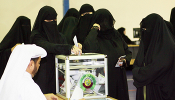 Women vote at municipal elections in Doha (Reuters/Stringer)