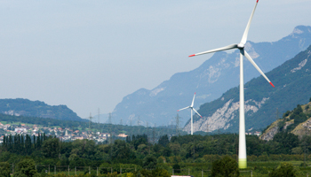 Two wind turbines are pictured in Martigny, Switzerland, August 2009 (Reuters/Denis Balibouse)