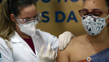 Administering China's Sinovac vaccine during trials, Brazil (Reuters/Diego Vara)