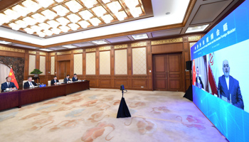 Videoconference between the Chinese and Iranian foreign ministers, Beijing, June 24 (Xinhua/Shutterstock)