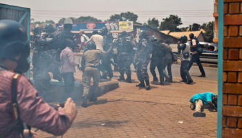 Police attempt to block media from covering the arrest of opposition leader Kizza Besigye following the 2016 elections (Ben Curtis/AP/Shutterstock)
