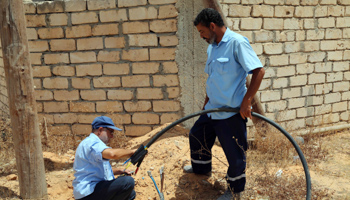 Electricity maintenance workers in Tripoli, Libya, June (Xinhua/Shutterstock)