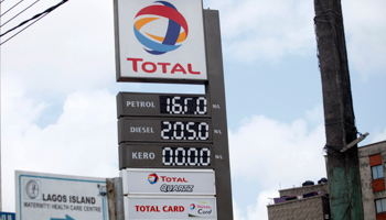 Fuel prices are displayed at a fuel station near a local market in Lagos, September 10 (Akintunde Akinleye/EPA-EFE/Shutterstock)