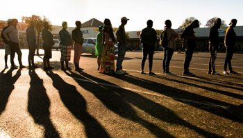 Pensioners queue for their social grant at a pay point in Cape Town, March 30 (Uncredited/AP/Shutterstock)