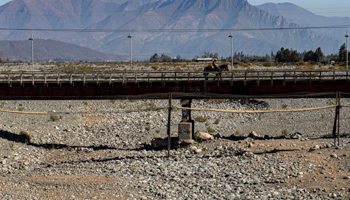 A bridge crossing a dry river bed in Chile's Valparaiso region (Esteban Felix/AP/Shutterstock)