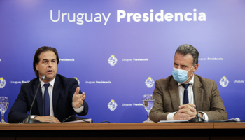 President Luis Lacalle Pou (l) and Health Minister Daniel Salinas announce that Uruguay will be closed to foreign tourists this summer (Raul Martinez/EPA-EFE/Shutterstock)