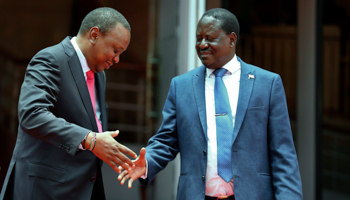 President Uhuru Kenyatta and opposition leader Raila Odinga reconcile through the ‘handshake’ that launched the BBI, 9 March 2018 (Brian Inganga/AP/Shutterstock)