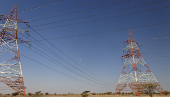 Electricity transmission lines in Oman (Dirk Funhoff/imageBROKER/Shutterstock)