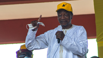 Guinea’s President Alpha Conde speaks to supporters of the ruling Rally of the Guinean People (RPG) at an election rally in Conakry, October 16 (Papa Seck/EPA-EFE/Shutterstock)