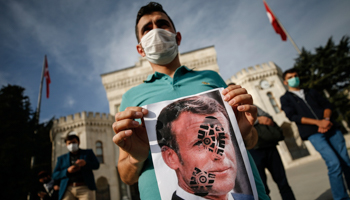 Turks protest against French President Emmanuel Macron after President Recep Tayyip Erdogan accuses him of Islamophobia, Istanbul, October 25 (Emrah Gurel/AP/Shutterstock)