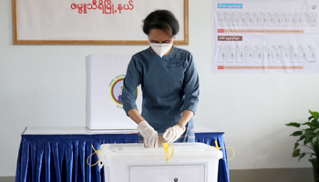 State Counsellor Aung San Suu Kyi casting her ballot during early voting for the general election (Maung Lonlan/EPA-EFE/Shutterstock)
