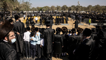 Crowd of ultra-Orthodox Jews gathered for the funeral of a rabbi, Ashdod, Israel, October 5 (Tsafrir Abayov/AP/Shutterstock)