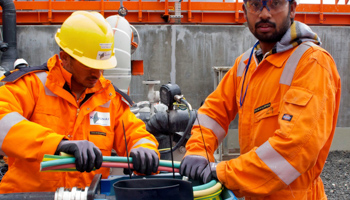 Technicians at the giant Kashagan oil field (Peter Leonard/AP/Shutterstock)