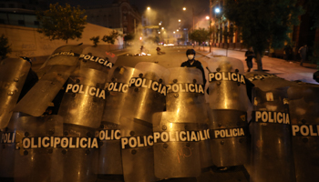 Police prepare to stop protesters reaching Congress as Manuel Merino was sworn in as president (Rodrigo Abd/AP/Shutterstock)