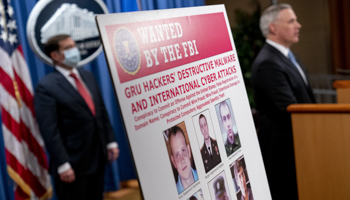 A poster showing six Russian GRU hackers indicted by the US Department of Justice, 19 October (Andrew Harnik/POOL/EPA-EFE/Shutterstock)
