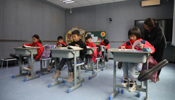 Pupils attend class at Bulenggou Primary School in Dongxiang Autonomous County in northwest China's Gansu Province, on November 9 (Xinhua/Shutterstock)