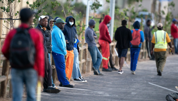 Informal workers wait for day work, Cape Town, South Africa, June 24 (Nic Bothma/EPA-EFE/Shutterstock)