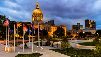 Georgia's state capitol illuminated at night (Rob Mainer / Shutterstock)