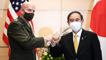 Commandant of the US Marine Corps General David H. Berger (L) and Japan's Prime Minister Yoshihide Suga (R) (Charly Triballeau/POOL/EPA-EFE/Shutterstock)