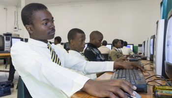 Students using computers in a township classroom, KwaZulu-Natal, South Africa (imageBROKER/Shutterstock)