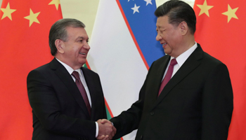 Uzbek President Shavqat Mirzioyev (L) with Chinese President Xi Jinping (Kenzaburo Fukuhara/Pool/EPA-EFE/Shutterstock)