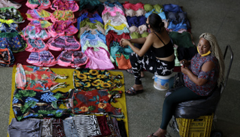 Informal street vendors in at a bus station in Brasilia (Eraldo Peres/AP/Shutterstock)