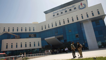 Security forces at the headquarters of the National Oil Corporation after an attack by gunmen in Tripoli, Libya. 2018 (Mohamed Ben Khalifa/AP/Shutterstock)