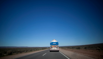 An oil tanker truck owned by state oil company YPF on a highway in Neuquen province, Argentina (Natacha Pisarenko/AP/Shutterstock)