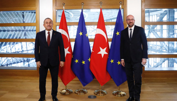 Turkish Foreign Minister Mevlut Cavusoglu (L) concluding a two-day official visit to Brussels on Friday, including meeting European Council President Charles Michel (R), Brussels, January 22 (Chine Nouvelle/SIPA/Shutterstock).