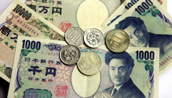 Japanese yen currency notes and coins (Timo Jaakonaho/Shutterstock)