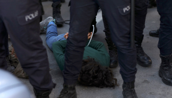 Riot police detain a protester amid demonstrations against President Erdogan's appointment of an Istanbul university rector linked to the ruling party, Ankara, February 5 (Burhan Ozbilici/AP/Shutterstock) 