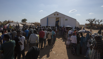 Tigrayan refugees in Sudan queue for food aid, December 5, 2020 (Nariman El-Mofty/AP/Shutterstock)