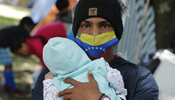 Venezuelan migrants at a camp in the separator of the northern highway in Bogota, Colombia, June 2020 (Mauricio Duenas Castaneda/EPA-EFE/Shutterstock)