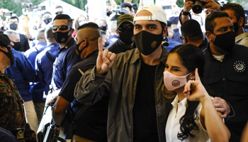 President Nayib Bukele and his wife Gabriela Rodriguez pose for a photo at a polling station in San Salvador, February 28 (Camilo Freedman/ZUMA Wire/Shutterstock)