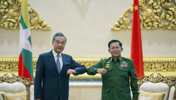 Chinese Foreign Minister Wang Yi (left) meeting Myanmar military Chief Min Aung Hlaing (right) in Naypyidaw in January (Xinhua/Shutterstock)