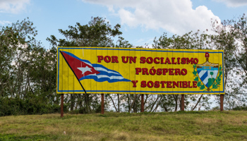 A public message board reads: 'For a prosperous and sustainable socialism' (Roberto Machado Noa/Shutterstock)