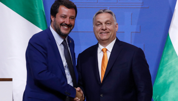Italian League party leader Matteo Salvini (L) and Hungarian Prime Minister Viktor Orban shake hands during a joint press conference in Budapest, May 2, 2019 (Szilard Koszticsak/EPA-EFE/Shutterstock)