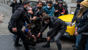 Police arrest a protester at a demonstration by women and LGBTQ people ahead of International Women’s Day, Istanbul, March 6 (Erhan Demirtas/NurPhoto/Shutterstock).
