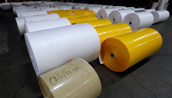 Rolls of plastic, some of which contain recycled content, at a recycling centre in California (Reed Saxon/AP/Shutterstock)