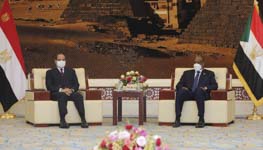 Egyptian President Abdel Fattah el-Sisi meets Sudanese Chairman of the Sovereign Council Abdel Fattah al-Burhan in Khartoum, Sudan (Uncredited/AP/Shutterstock)