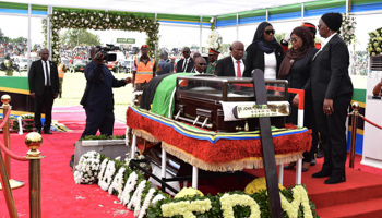 President Samia Suluhu Hassan pays her respects at the state funeral for former President John Magufuli, March 22 (CHINE NOUVELLE/SIPA/Shutterstock)