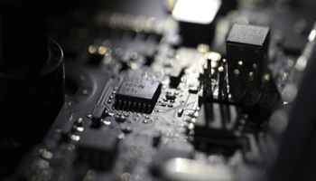 A computer circuit board (Jenny Kane/AP/Shutterstock)