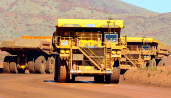 Haulage trucks at an iron ore mine in the Pilbara region of West Australia (Alan Porritt/EPA-EFE/Shutterstock)