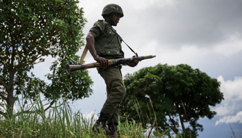 A Congolese soldier stands guard at a position near the ADF's area of operations, May 11, 2019 (Huge Kinsella Cunningham/EPA-EFE/Shutterstock)