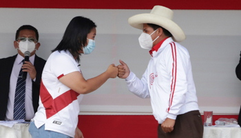Peruvian presidential candidates Keiko Fujimori and Pedro Castillo at the end of their debate on May 1 (Francisco Vigo/AP/Shutterstock)