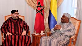 The Moroccan King Mohammed VI (L) visits Gabonese President Ali Bongo (R) at military Hospital in Rabat, Morocco, December 3, 2018 (Uncredited/AP/Shutterstock)