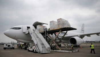 Medical aid for India being loaded onto a cargo plane at Paris Charles de Gaulle Airport (Lewis Joly/Pool/EPA-EFE/Shutterstock)