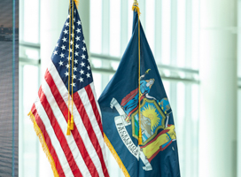 The flags of the United States and New York State side by side, May 2021 (Lev Radin/Pacific Press/Shutterstock)