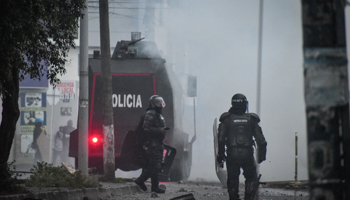 Riot police try to disband protesters with tear gas in Pasto, Narino. May 26, 2021 (Camilo Erasso/LongVisual via ZUMA Wire/Shutterstock)
